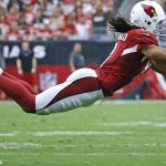 Arizona Cardinals wide receiver Larry Fitzgerald jumps to make a reception against the Tampa Bay Buccaneers in the second half  of an NFL football game, Sunday, Sept. 18, 2016 in Glendale  Ariz. (David Kadlubowski/The Republic via AP)