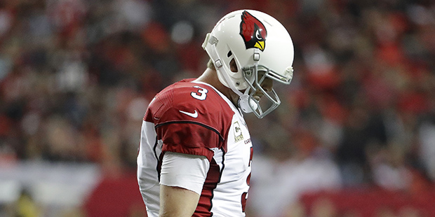 Arizona Cardinals quarterback Carson Palmer (3) walks off the field after the Cardinals missed a tw...