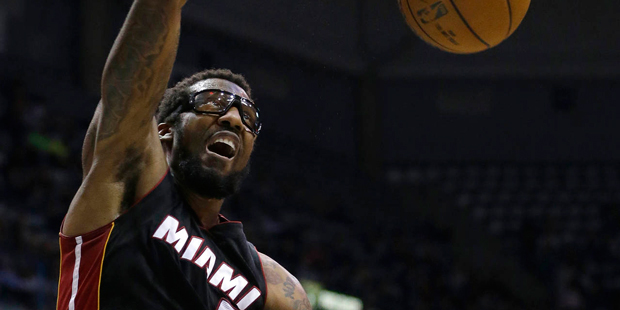 Miami Heat's Amare Stoudemire dunks during the first half of an NBA basketball game against the Mil...