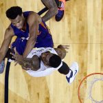 Phoenix Suns forward TJ Warren (12) shoots against New Orleans Pelicans forward Terrence Jones during the first half of an NBA basketball game in New Orleans, Friday, Nov. 4, 2016. (AP Photo/Gerald Herbert)