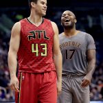 Atlanta Hawks forward Kris Humphries (43) and Phoenix Suns forward P.J. Tucker (17) laugh during the first half of an NBA basketball game, Wednesday, Nov. 30, 2016, in Phoenix. (AP Photo/Matt York)