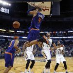 Phoenix Suns center Tyson Chandler (4) dunks over New Orleans Pelicans forward Anthony Davis during the first half of an NBA basketball game in New Orleans, Friday, Nov. 4, 2016. (AP Photo/Gerald Herbert)