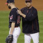 Cleveland Indians manager Terry Francona takes starting pitcher Corey Kluber out of the game during the fifth inning of Game 7 of the Major League Baseball World Series against the Chicago Cubs Wednesday, Nov. 2, 2016, in Cleveland. (AP Photo/Gene J. Puskar)