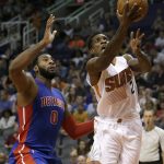 Phoenix Suns guard Eric Bledsoe drives past Detroit Pistons center Andre Drummond (0) during the third quarter of an NBA basketball game, Wednesday, Nov. 9, 2016, in Phoenix. The Suns defeated the Pistons 107-100. (AP Photo/Rick Scuteri)