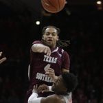 Texas Southern guard Kevin Scott (4) makes a pass over Arizona guard Kobi Simmons during the first half of an NCAA college basketball game, Wednesday, Nov. 30, 2016, in Tucson, Ariz. (AP Photo/Rick Scuteri)