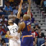 Phoenix Suns forward P.J. Tucker (17) shoots against New Orleans Pelicans forward Anthony Davis during the first half of an NBA basketball game in New Orleans, Friday, Nov. 4, 2016. (AP Photo/Gerald Herbert)