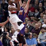 Portland Trail Blazers forward Maurice Harkless goes to the basket as Phoenix Suns forward Dragan Bender defends during the second half of an NBA basketball game in Portland, Ore., Tuesday, Nov. 8, 2016. (AP Photo/Craig Mitchelldyer)