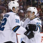 San Jose Sharks left wing Patrick Marleau (12) celebrates his goal against the Arizona Coyotes with center Tomas Hertl (48) during the first period of an NHL hockey game Tuesday, Nov. 1, 2016, in Glendale, Ariz. (AP Photo/Ross D. Franklin)