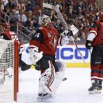Arizona Coyotes' Louis Domingue (35) stands up after giving up a goal to San Jose Sharks left wing Patrick Marleau as Coyotes' defenseman Luke Schenn (2) and left wing Jamie McGinn (88) skate away during the first period of an NHL hockey game Tuesday, Nov. 1, 2016, in Glendale, Ariz. (AP Photo/Ross D. Franklin)