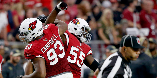 Calais Campbell and Chandler Jones celebrate during the Arizona Cardinals' 23-20 win against the Sa...