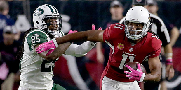 Arizona Cardinals wide receiver Larry Fitzgerald (11) runs after the catch as New York Jets strong ...
