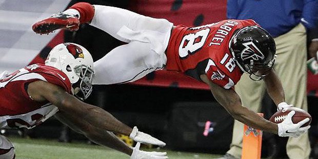 Atlanta Falcons wide receiver Taylor Gabriel dives for his second touchdown against the Arizona Car...