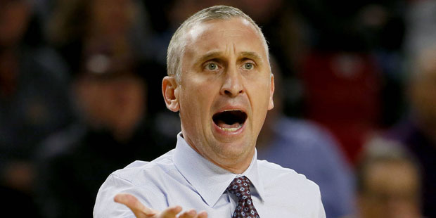 Arizona State coach Bobby Hurley yell instructions to his players from the sidelines during the fir...
