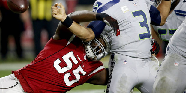 Arizona Cardinals outside linebacker Chandler Jones (55) forces Seattle Seahawks quarterback Russel...