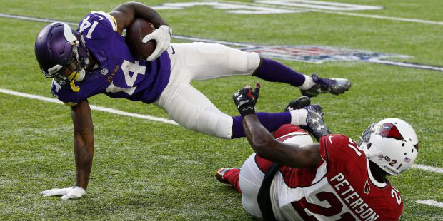 Patrick Peterson of the Arizona Cardinals attempts to make a tackle in the Minnesota Vikings' 30-24...