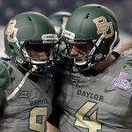 Baylor wide receiver KD Cannon (9) celebrates his touchdown catch with quarterback Zach Smith (4) during the first half of the Cactus Bowl NCAA college football game against Boise State, Tuesday, Dec. 27, 2016, in Phoenix. (AP Photo/Rick Scuteri)