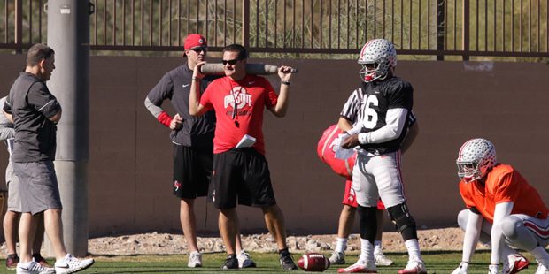 Ohio State co-offensive coordinator and quarterbacks coach Tim Beck (left, in red shirt) led Scotts...