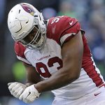 Arizona Cardinals defensive end Calais Campbell reacts after a sack against the Seattle Seahawks in the first half of an NFL football game, Saturday, Dec. 24, 2016, in Seattle. (AP Photo/John Froschauer)