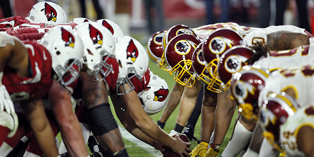 The Washington Redskins and the Arizona Cardinals line up during the second half of an NFL football...