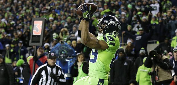 Seattle Seahawks wide receiver Doug Baldwin catches a pass in the end zone for a touchdown against ...