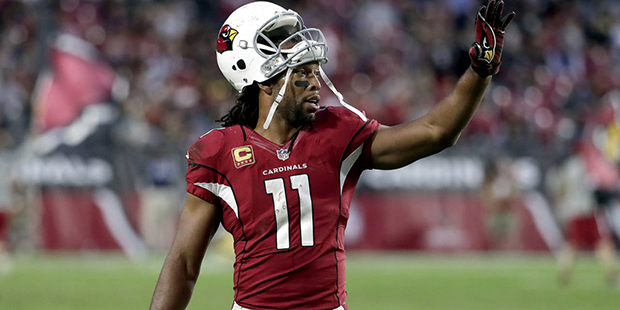 Arizona Cardinals wide receiver Larry Fitzgerald (11) waves during the second half of an NFL footba...