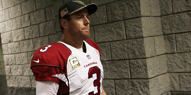 Arizona Cardinals quarterback Carson Palmer returns to the locker room after exiting an x-ray room ...