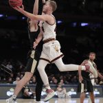 Arizona State guard Kodi Justice (44) goes up for a shot against Purdue guard Ryan Cline (14) in the first half of an NCAA college basketball game, Tuesday, Dec. 6, 2016, in New York. (AP Photo/Julie Jacobson)
