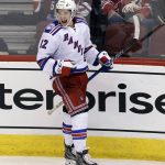 New York Rangers left wing Matt Puempel celebrates after scoring his third goal of the NHL hockey game against the Arizona Coyotes, during the third period Thursday, Dec. 29, 2016, in Glendale, Ariz. (AP Photo/Rick Scuteri)