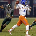 Boise State quarterback Brett Rypien (4) passes as Baylor defensive back Travon Blanchard (48) pursues during the first half of the Cactus Bowl NCAA college football game, Tuesday, Dec. 27, 2016, in Phoenix. (AP Photo/Rick Scuteri)