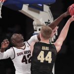Arizona State forward Jethro Tshisumpa (42) blocks a shot attempt by Purdue center Isaac Haas (44) in the first half of an NCAA college basketball game, Tuesday, Dec. 6, 2016, in New York. (AP Photo/Julie Jacobson)
