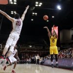 Arizona State guard Tra Holder (0) makes a 3-point basket over Stanford center Josh Sharma (20) during the first half of an NCAA college basketball game Friday, Dec. 30, 2016, in Stanford, Calif. (AP Photo/Marcio Jose Sanchez)