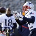 New England Patriots wide receiver Michael Floyd catches a pass as Matthew Slater (18) looks on during an NFL football team practice Wednesday, Dec. 21, 2016, in Foxborough, Mass. (AP Photo/Elise Amendola)