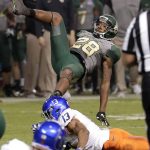 Baylor safety Orion Stewart (28) is hit by Boise State running back Jeremy McNichols (13) after Stewart recovered a Boise State fumble during the second half of the Cactus Bowl NCAA college football game, Tuesday, Dec. 27, 2016, in Phoenix. (AP Photo/Matt York)