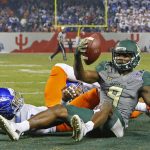 Baylor wide receiver KD Cannon (9) holds up the ball after a 30-yard touchdown reception against Boise State  during the first quarter of the Cactus Bowl NCAA college football game Tuesday, Dec. 27, 2016, in Phoenix. (David Kadlubowski/The Arizona Republic via AP)