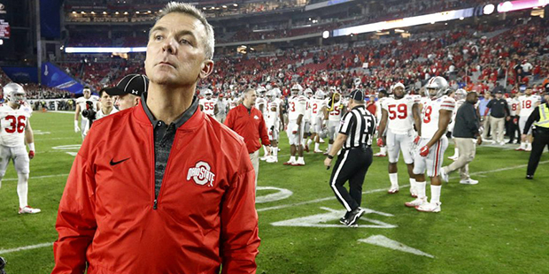 Ohio State coach Urban Meyer stands at midfield after the team's Fiesta Bowl NCAA college football ...