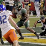 Baylor safety Orion Stewart (28) intercepts a pass in the end zone as Boise State wide receiver Thomas Sperbeck (82) defends during the first half of the Cactus Bowl NCAA college football game, Tuesday, Dec. 27, 2016, in Phoenix. (AP Photo/Matt York)