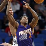 Phoenix Suns' Eric Bledsoe, right, loses the ball as he is fouled by Minnesota Timberwolves' Zach LaVine during the second half of an NBA basketball game Monday, Dec. 19, 2016, in Minneapolis. The Timberwolves won 115-108. (AP Photo/Jim Mone)