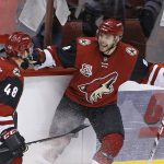 Arizona Coyotes right wing Tobias Rieder (8) celebrates his goal against the Los Angeles Kings with left wing Jordan Martinook (48) during the third period of an NHL hockey game Thursday, Dec. 1, 2016, in Glendale, Ariz. The Kings defeated the Coyotes 4-3. (AP Photo/Ross D. Franklin)