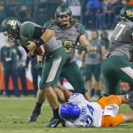 Baylor quarterback Zach Smith (4) gets stopped by Boise State Broncos defensive end Sam McCaskill (94) during the first quarter of the Cactus Bowl NCAA college football game Tuesday, Dec. 27, 2016, in Phoenix. (David Kadlubowski/The Arizona Republic via AP)