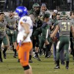Baylor players run on the field as time expires during the second half of the Cactus Bowl NCAA college football game against Boise State, Tuesday, Dec. 27, 2016, in Phoenix. Baylor won 31-12. (AP Photo/Matt York)