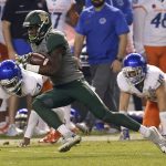 Baylor wide receiver Chris Platt (14) breaks the tackle of Boise State safety Kekoa Nawahine (10) and cornerback Tion Wright (3) during the first half of the Cactus Bowl NCAA college football game, Tuesday, Dec. 27, 2016, in Phoenix. (AP Photo/Rick Scuteri)