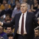 Houston Rockets coach Mike D'Antoni gestures during the first half of the team's NBA basketball game against the Phoenix Suns, Wednesday, Dec. 21, 2016, in Phoenix. (AP Photo/Matt York)