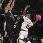 Arizona State guard Shannon Evans II (11) puts up a shot against Purdue in the first half of an NCAA college basketball game, Tuesday, Dec. 6, 2016, in New York. (AP Photo/Julie Jacobson)