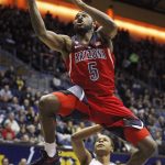 Arizona's Kadeem Allen (5) goes up to shoot in front of California's Charlie Moore during the first half of an NCAA college basketball game, Friday, Dec. 30, 2016, in Berkeley, Calif. (AP Photo/George Nikitin)