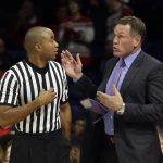Grand Canyon head coach Dan Majerle talks to an NCAA official during the second half of an NCAA college basketball game against Arizona, Wednesday, Dec. 14, 2016, in Tucson, Ariz. (AP Photo/Rick Scuteri)