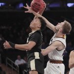 Purdue guard Carsen Edwards (3) is fouled while shooting in the second half of an NCAA college basketball game, Tuesday, Dec. 6, 2016, in New York. Purdue won 97-64. (AP Photo/Julie Jacobson)