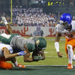 Baylor wide receiver KD Cannon (9) catches a 30-yard touchdown pass against Boise State cornerback Jonathan Moxey (2)  during the first quarter of the Cactus Bowl NCAA college football game Tuesday, Dec. 27, 2016, in Phoenix. (David Kadlubowski/The Arizona Republic via AP)