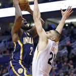Indiana Pacers guard Rodney Stuckey (2) gets fouled by Phoenix Suns center Alex Len (21) as Stuckey goes up for a shot during the first half of an NBA basketball game Wednesday, Dec. 7, 2016, in Phoenix. (AP Photo/Ross D. Franklin)