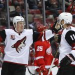 Arizona Coyotes left wing Lawson Crouse (67) celebrates his goal against the Detroit Red Wings with Martin Hanzal (11) in the first period of an NHL hockey game, Tuesday, Dec. 13, 2016, in Detroit. (AP Photo/Paul Sancya)