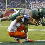 Baylor wide receiver KD Cannon (9) catches a 30-yard touchdown pass against Boise State cornerback Jonathan Moxey (2) during the first quarter of the Cactus Bowl NCAA college football game Tuesday, Dec. 27, 2016 in Phoenix. (David Kadlubowski/The Arizona Republic via AP)